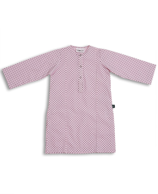 Perfect soft pink cotton kurta pajama set with black polka dots, featuring a round neck and button placket, laid flat on a pink background. Watm and Soft fabric is perfect to pair with sweater or jacket in this weather to give a perfect look for November wear. Made with love in Pakistan for eastern clothing to be worn in Europe and Worldwide