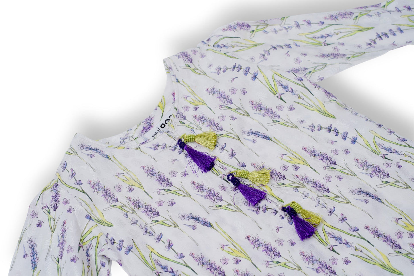 White cotton kids kurta and loose trouser set with lavender floral print, tassel neckline, and lace-edged sleeves — Pakistani kids clothing handcrafted in breathable fabric