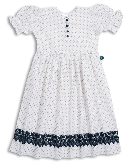 White cotton kids frock and trouser set with black diamond pattern, lace hem, puff sleeves, and button placket — Pakistani kids clothing, breathable and elegant