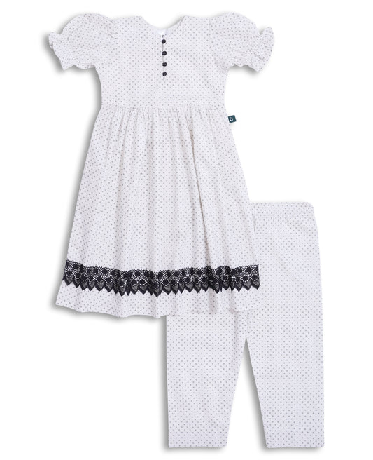 White cotton kids frock and trouser set with black diamond pattern, lace hem, puff sleeves, and button placket — Pakistani kids clothing, breathable and elegant
