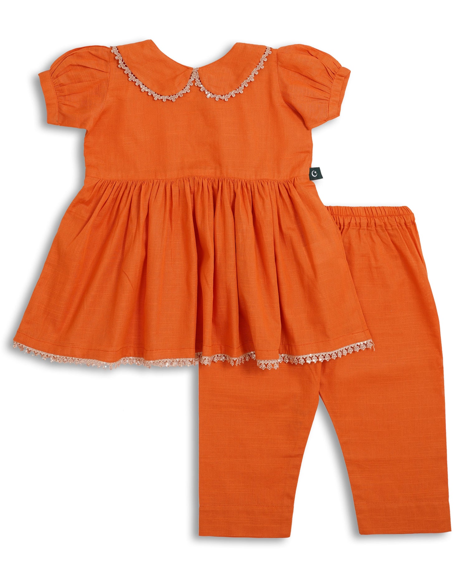 Orange cotton khaddar girls frock and trouser set with lace-trim Peter Pan collar, gathered waist, and delicate hem—Pakistani kids clothing